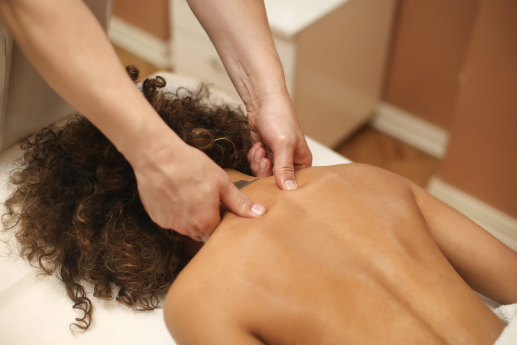 Neck adjustment massage therapy